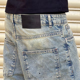STAINED BAGGY JEANS