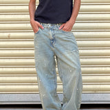 STAINED BAGGY JEANS