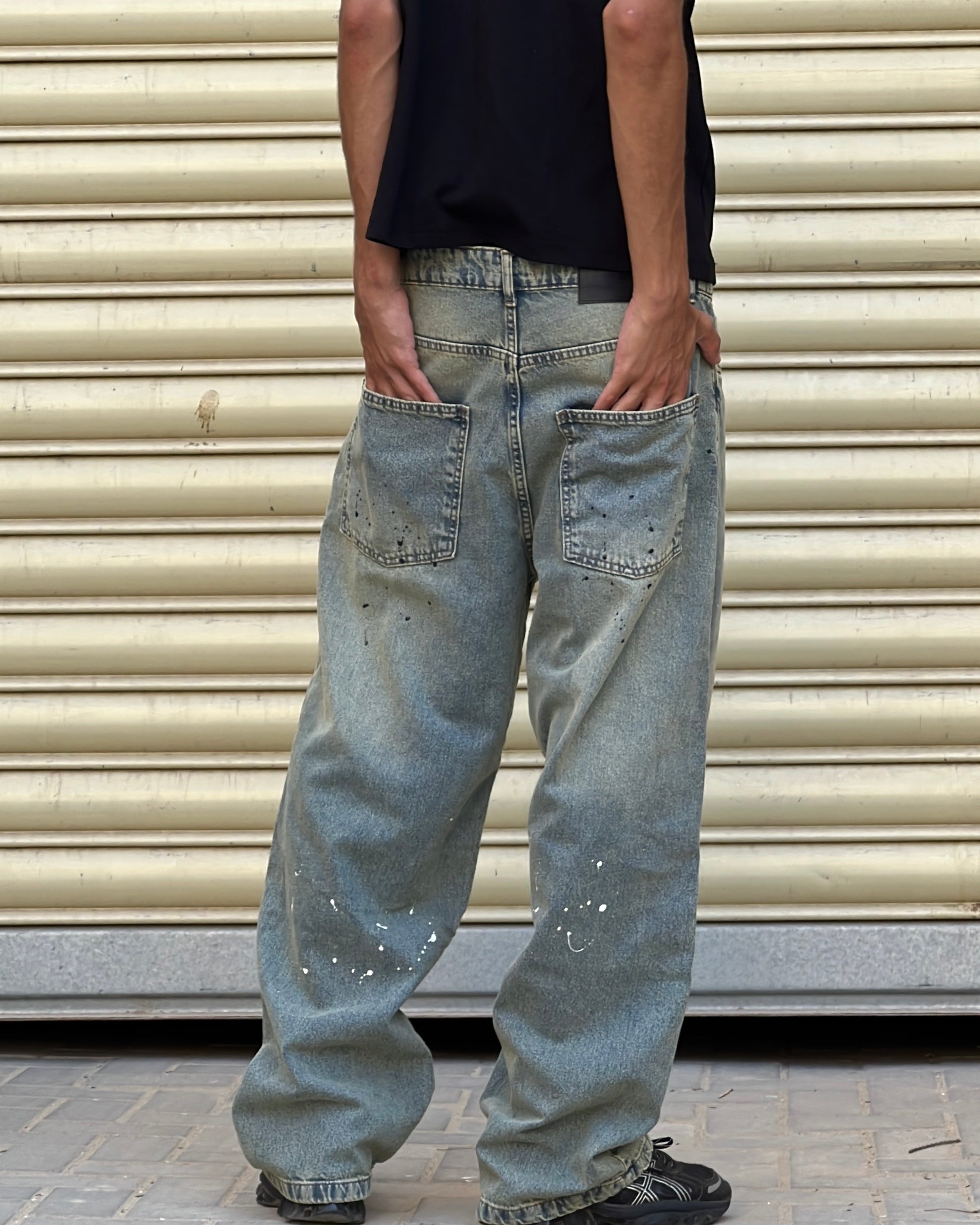 STAINED BAGGY JEANS