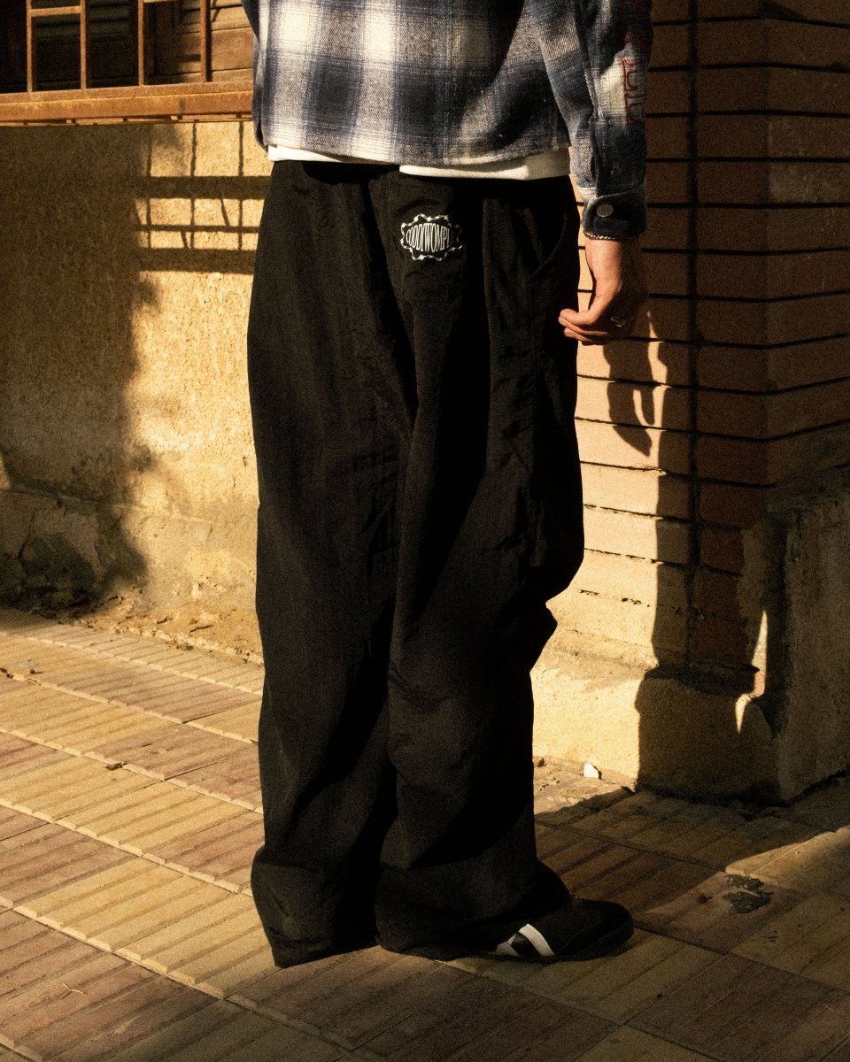 BLACK WATERPROOF PARACHUTE PANTS - CODDIWOMPLE