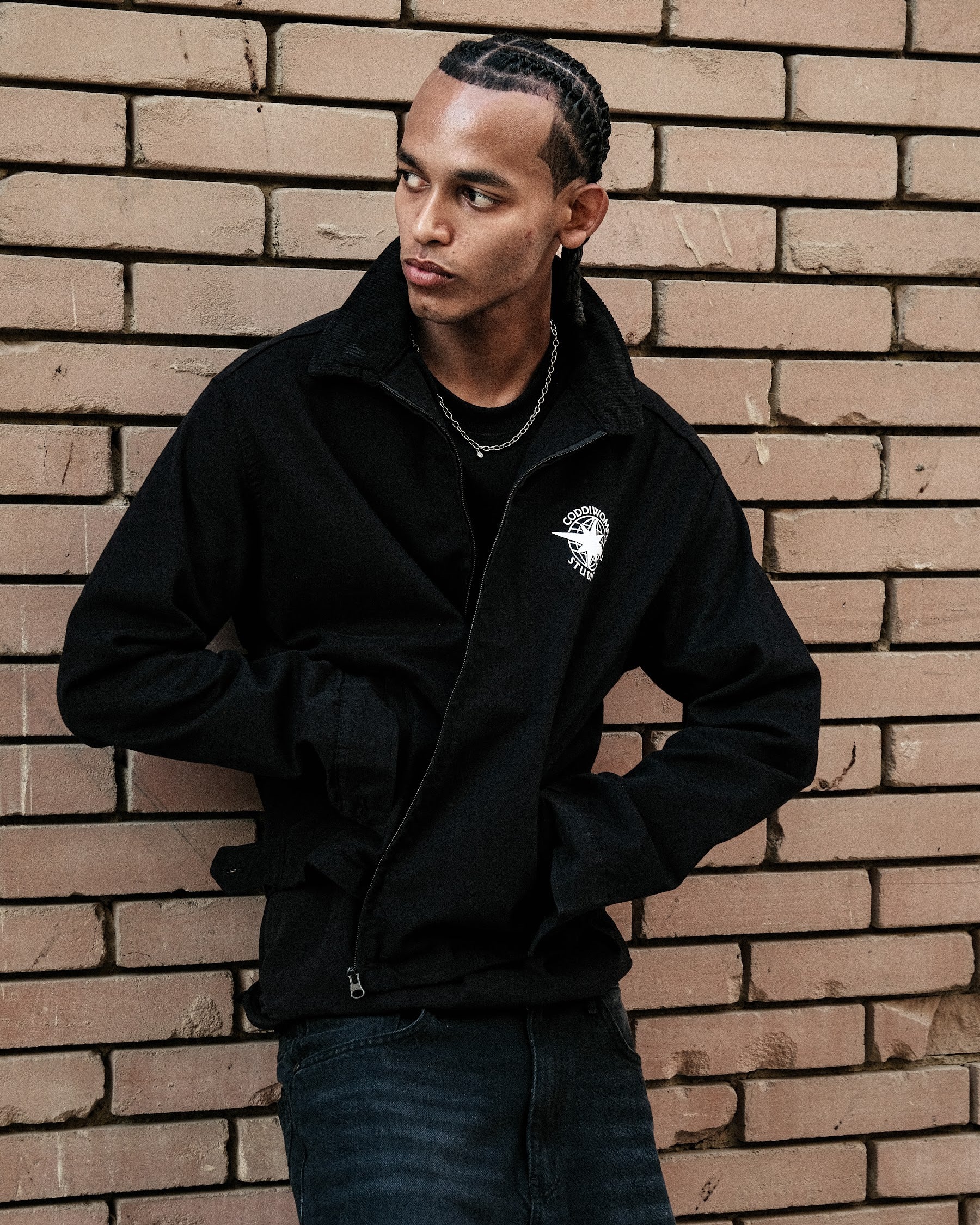 Coddiwomple Black Work Jacket V2, 3/4 view on model