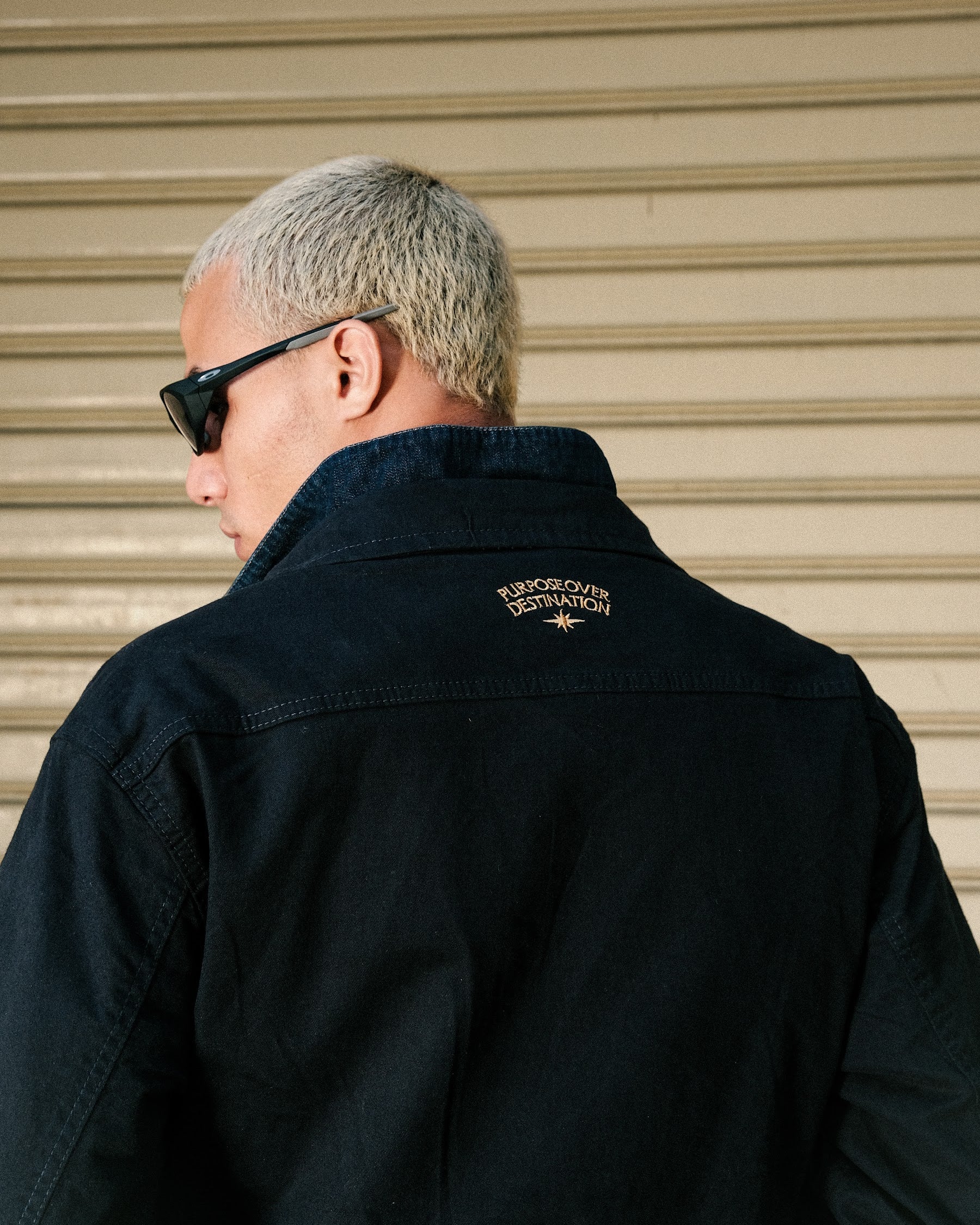 Coddiwomple Navy Work Jacket, back logo close-up