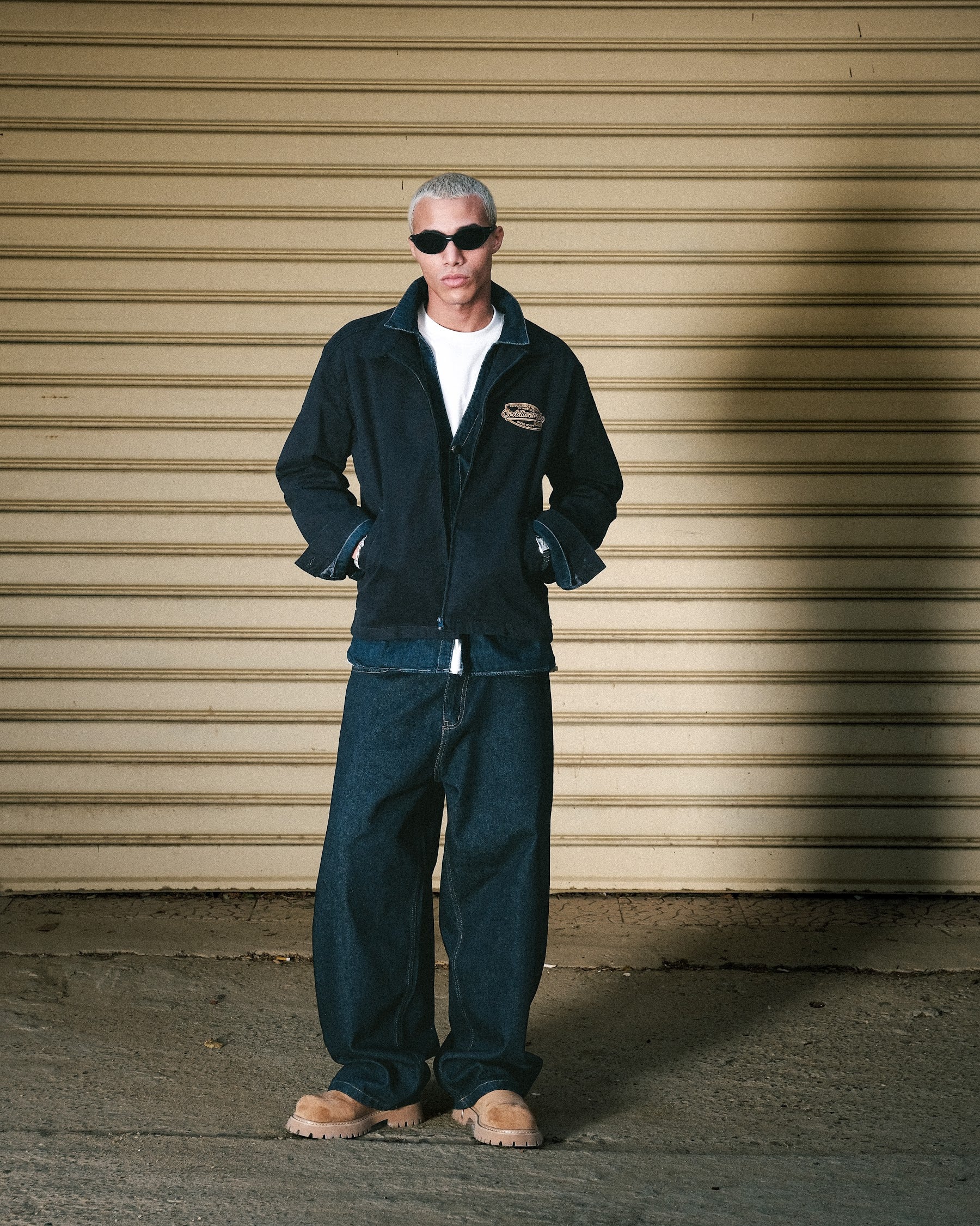 Coddiwomple Navy Work Jacket, full-length front on model