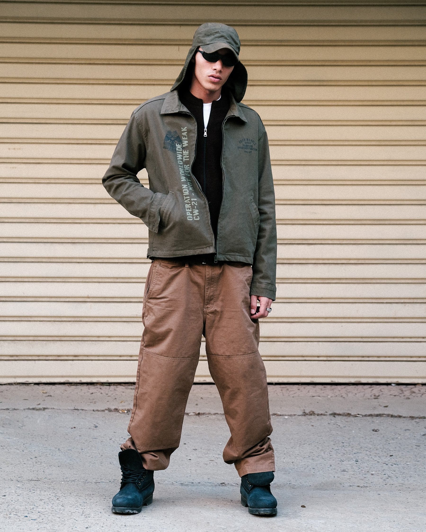 Coddiwomple Olive Work Jacket, full-length front on model